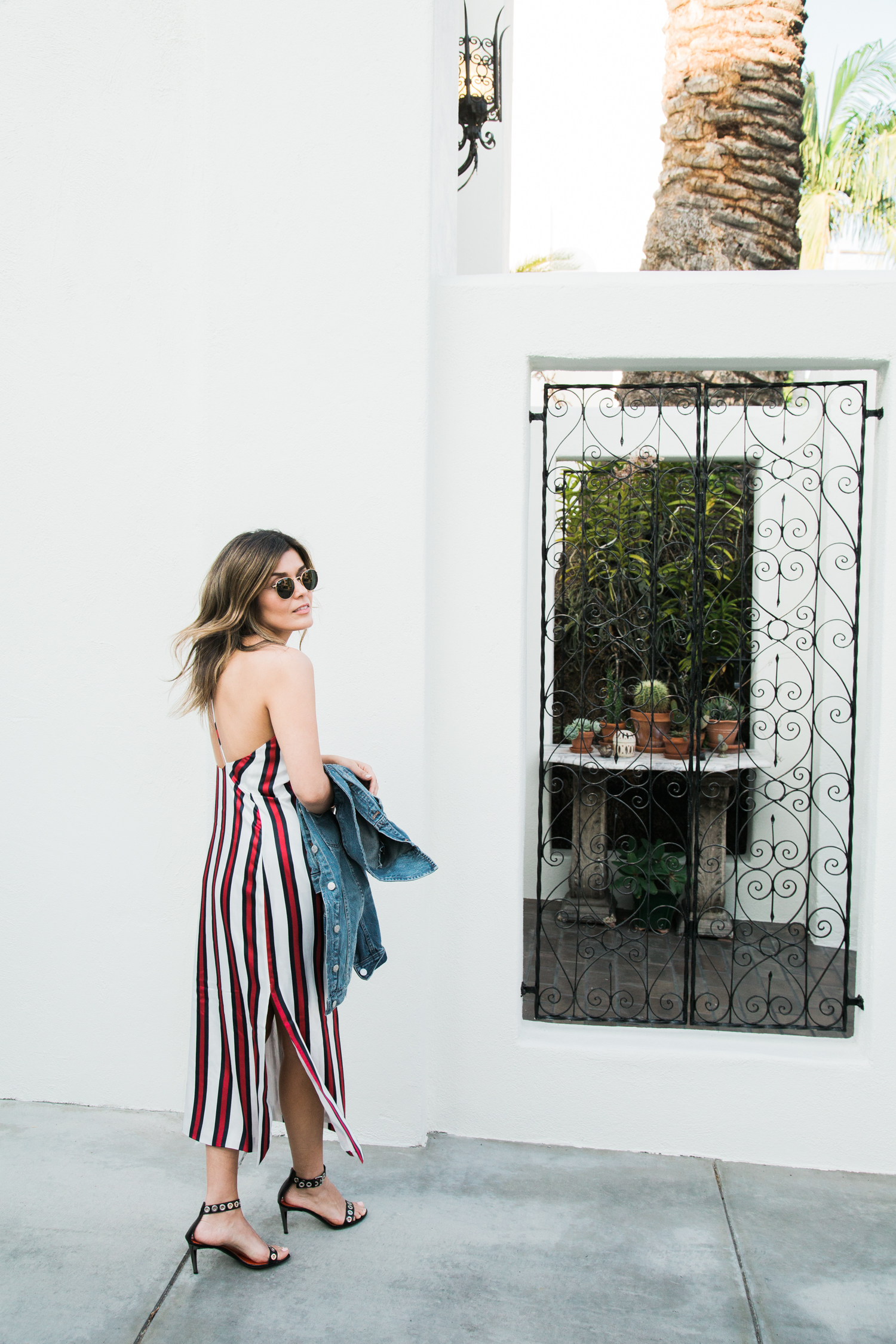 Sara Azani of Style MBA wearing Finders Keepers striped dress